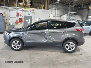 2014 Ford Escape SE with VIN 1FMCU9G99EUC45854, listed as a IAAI auction lot 41986959 with 124,591 mi miles. Bid and sale history available at carsss.com. Image 14.