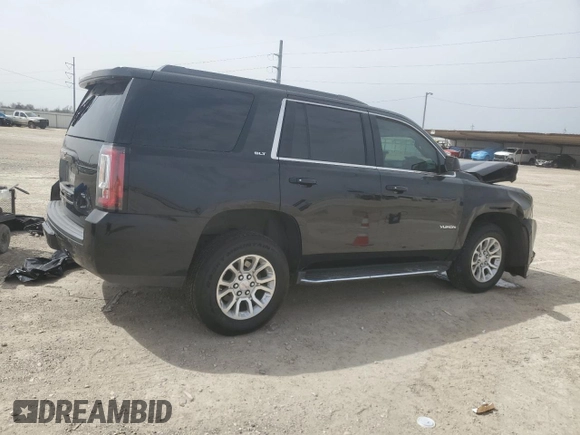 2019 GMC Yukon SLT with VIN 1GKS2BKC5KR166412, listed as a Copart auction lot 48030905 with 125,774 mi miles and Salvage Title. Bid and sale history available at DreamBid. Image 3.