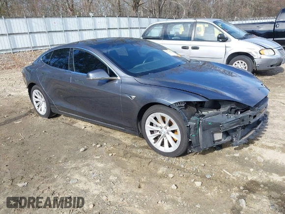 2017 Tesla Model S 100D with VIN 5YJSA1E23HF198592, listed as a IAAI auction lot 41721755 with 127,946 mi miles. Bid and sale history available at carsss.com. Image 1.