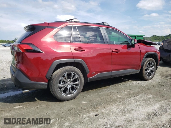 2023 Toyota RAV4 Hybrid XLE Premium with VIN JTMB6RFV2PD541262, listed as a Copart auction lot 60106845 with 32,447 mi miles and Salvage title. Bid and sale history available at DreamBid. Image 3.