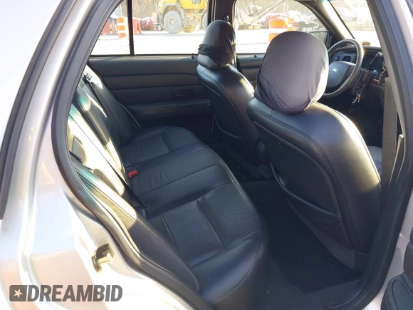 2005 Ford Crown Victoria LX z VIN 2FAFP74W85X121984, wystawiony jako IAAI lot #41427678 z przebiegiem 113 437 mil mil oraz . Historia ofert i sprzedaży dostępna na DreamBid. Obrazek 8.