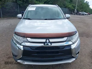 2016 Mitsubishi Outlander SE with VIN JA4AD3A34GZ005690, listed as a IAAI auction lot 42547477 with 79,040 mi miles and . Bid and sale history available at DreamBid. Image 13.
