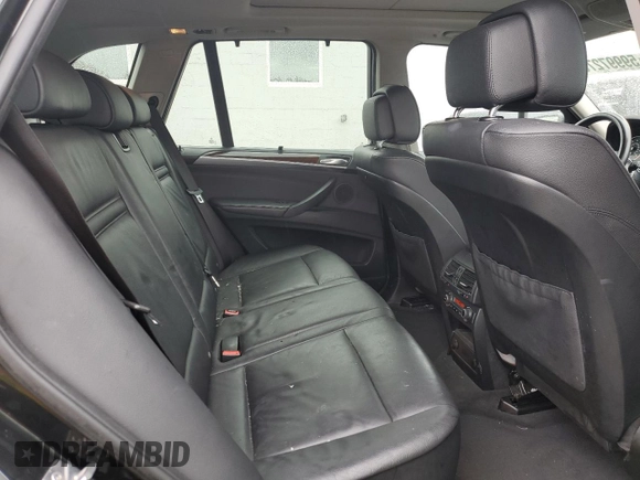 2012 BMW X5 35i with VIN 5UXZV4C57CL765053, listed as a Copart auction lot 59997275 with 157,943 mi miles and Salvage title. Bid and sale history available at DreamBid. Image 11.