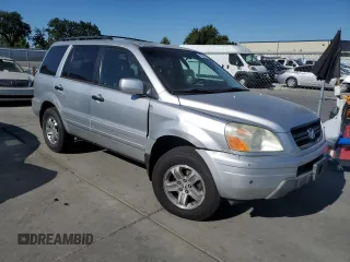 2005 Honda Pilot EX-L z VIN 2HKYF18635H569581, wystawiony jako Copart lot #57295595 z przebiegiem 209 697 mil mil oraz Szkoda całkowita • Salvage title. Historia ofert i sprzedaży dostępna na DreamBid. Obrazek 4.