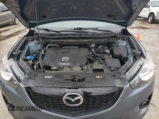 2015 Mazda CX-5 Grand Touring with VIN JM3KE2DY4F0526671, listed as a Copart auction lot 46520505 with 129,017 mi miles and Salvage Title. Bid and sale history available at carsss.com. Image 12.