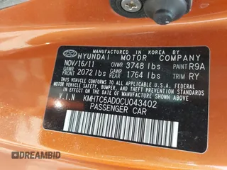 2012 Hyundai Veloster w/Gray Int с VIN KMHTC6AD0CU043402, выставлен на аукционе IAAI как лот 42406321 с пробегом 116 734 миль миль и . История ставок и продаж доступна на DreamBid. Изображение 9.