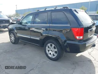 2009 Jeep Grand Cherokee with VIN 1J8HS68T49C524111, listed as a IAAI auction lot 41605917 with 133,441 mi miles and . Bid and sale history available at DreamBid. Image 3.