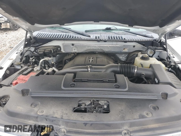 2015 Lincoln Navigator z VIN 5LMJJ3HT1FEJ03496, wystawiony jako Copart lot #77615394 z przebiegiem 118 636 mil mil oraz Szkoda całkowita • Salvage title. Historia ofert i sprzedaży dostępna na DreamBid. Obrazek 13.