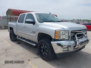 2013 Chevrolet Silverado 1500 LT with VIN 3GCPCSE08DG297496, listed as a IAAI auction lot 42046611 with 246,657 mi miles and . Bid and sale history available at DreamBid. Image 1.