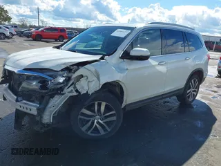 2017 Honda Pilot Elite with VIN 5FNYF6H06HB041609, listed as a IAAI auction lot 41804477 with 134,535 mi miles and . Bid and sale history available at DreamBid. Image 18.