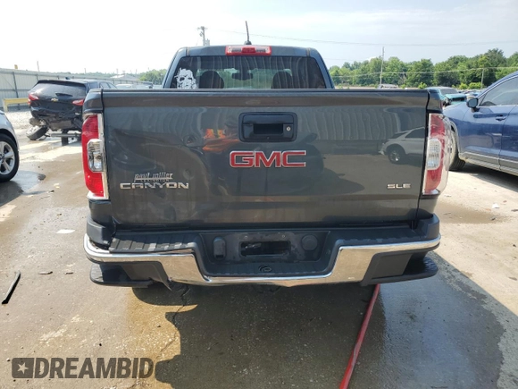 2015 GMC Canyon 2WD SLE with VIN 1GTH5BEA7F1147162, listed as a Copart auction lot 58018514 with 68,014 mi miles and Salvage Title. Bid and sale history available at carsss.com. Image 6.