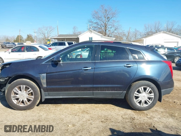 2015 Cadillac SRX with VIN 3GYFNAE35FS608595, listed as a IAAI auction lot 41282751 with 127,055 mi miles and . Bid and sale history available at DreamBid. Image 15.