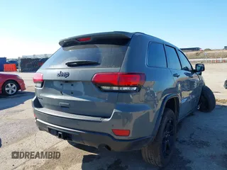 2019 Jeep Grand Cherokee Laredo E with VIN 1C4RJFAG2KC611457, listed as a IAAI auction lot 42212982 with 97,603 mi miles and . Bid and sale history available at DreamBid. Image 4.