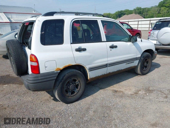 2003 Chevrolet Tracker z VIN 2CNBJ13C236911259, wystawiony jako IAAI lot #42447129 z przebiegiem 122 370 mil mil oraz . Historia ofert i sprzedaży dostępna na DreamBid. Obrazek 4.