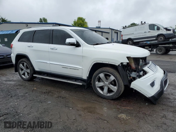 2014 Jeep Grand Cherokee Limited with VIN 1C4RJFBG9EC200141, listed as a Copart auction lot 60507385 with 101,917 mi miles and Salvage title. Bid and sale history available at DreamBid. Image 4.