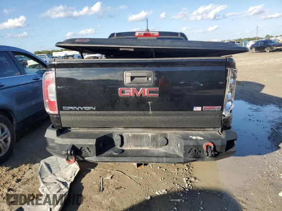 2015 GMC Canyon 4WD SLE with VIN 1GTH6BE33F1199189, listed as a Copart auction lot 87191114 with 199,477 mi miles and Salvage Title. Bid and sale history available at carsss.com. Image 6.