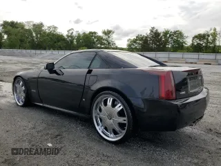 2006 Cadillac XLR z VIN 1G6YV36A265600782, wystawiony jako Copart lot #54352705 z przebiegiem 94 678 mil mil oraz Szkody całkowita. Historia ofert i sprzedaży dostępna na DreamBid. Obrazek 2.