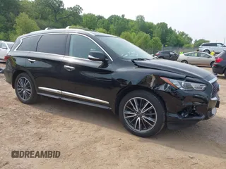 2020 Infiniti QX60 Luxe with VIN 5N1DL0MMXLC513079, listed as a IAAI auction lot 42341196 with 114,643 mi miles and . Bid and sale history available at DreamBid. Image 1.