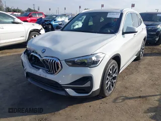 2022 BMW X1 sDrive28i with VIN WBXJG7C05N5U58988, listed as a IAAI auction lot 41466393 with 56,062 mi miles. Bid and sale history available at carsss.com. Image 2.