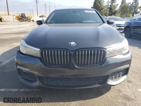 2019 BMW 7 Series 740i z VIN WBA7E2C57KB217388, wystawiony jako Copart lot #61867745 z przebiegiem 109 810 mil mil oraz Szkoda całkowita • Salvage title. Historia ofert i sprzedaży dostępna na DreamBid. Obrazek 5.