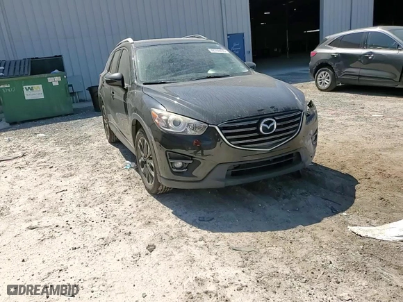 2016 Mazda CX-5 Grand Touring with VIN JM3KE2DY6G0842137, listed as a Copart auction lot 48769485 with 135,875 mi miles and Salvage Title. Bid and sale history available at carsss.com. Image 12.