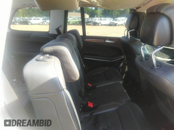 2014 Mercedes-Benz GL 450 z VIN 4JGDF7CE2EA287810, wystawiony jako IAAI lot #39696896 z przebiegiem 181 816 mil mil oraz . Historia ofert i sprzedaży dostępna na DreamBid. Obrazek 8.