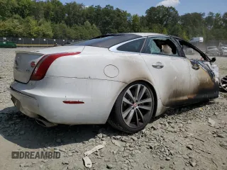 2015 Jaguar XJ with VIN SAJWA3HT8FMV90734, listed as a Copart auction lot 51419894 with Not Provided miles and Salvage Title. Bid and sale history available at DreamBid. Image 3.