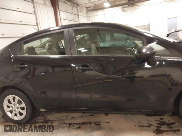2014 Kia Rio LX with VIN KNADM4A32E6409785, listed as a IAAI auction lot 41810262 with 183,669 mi miles. Bid and sale history available at carsss.com. Image 14.