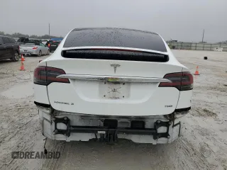2017 Tesla Model X 90D z VIN 5YJXCBE22HF076134, wystawiony jako Copart lot #41828555 z przebiegiem 214 443 mil mil oraz Szkody całkowita. Historia ofert i sprzedaży dostępna na DreamBid. Obrazek 6.