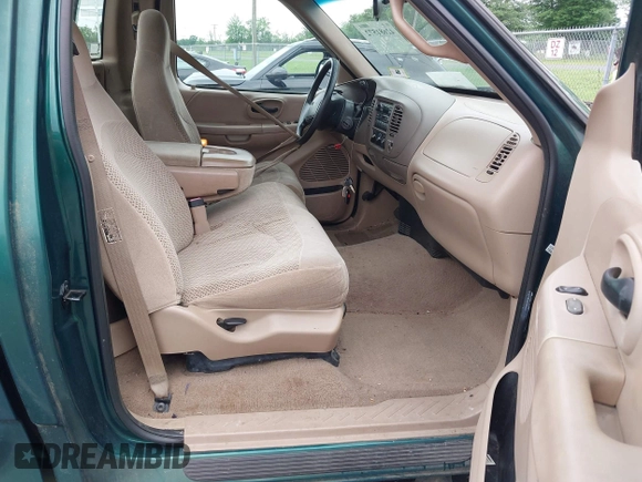 1999 Ford F-150 with VIN 2FTRF07W5XCB01716, listed as a IAAI auction lot 42681572 with 115,904 mi miles and . Bid and sale history available at DreamBid. Image 5.