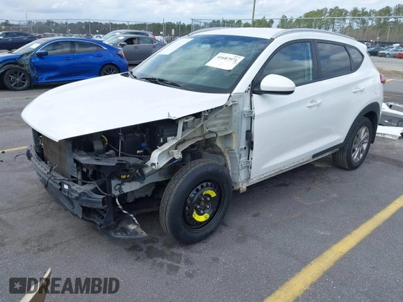 2017 Hyundai Tucson SE with VIN KM8J3CA44HU511581, listed as a IAAI auction lot 41687971 with 111,981 mi miles. Bid and sale history available at carsss.com. Image 2.
