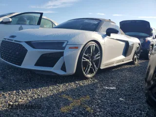 2021 Audi R8 Spyder performance z VIN WUA4BCFX5M7901463, wystawiony jako Copart lot #73882684 z przebiegiem Nie podano mil oraz Szkody całkowita. Historia ofert i sprzedaży dostępna na DreamBid. Obrazek 1.