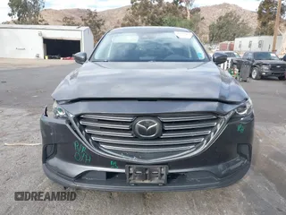 2018 Mazda CX-9 Sport with VIN JM3TCABY1J0224741, listed as a IAAI auction lot 41265876 with 126,686 mi miles and . Bid and sale history available at DreamBid. Image 13.