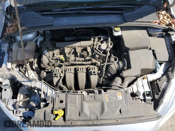 2018 Ford Focus SE z VIN 1FADP3F29JL206110, wystawiony jako Copart lot #53953515 z przebiegiem 80 841 mil mil oraz Szkoda całkowita • Salvage title. Historia ofert i sprzedaży dostępna na DreamBid. Obrazek 11.