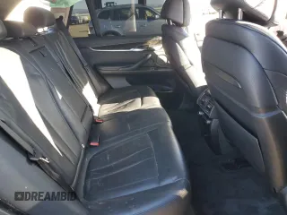 2014 BMW X5 xDrive35i z VIN 5UXKR0C59E0K51868, wystawiony jako Copart lot #79139994 z przebiegiem Nie podano mil oraz Szkoda całkowita • Salvage title. Historia ofert i sprzedaży dostępna na DreamBid. Obrazek 11.