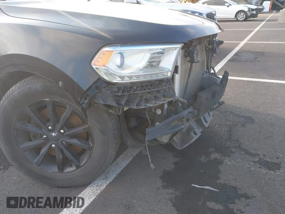 2014 Dodge Durango Limited with VIN 1C4SDHDT2EC405671, listed as a IAAI auction lot 39442398 with 154,469 mi miles and . Bid and sale history available at DreamBid. Image 16.