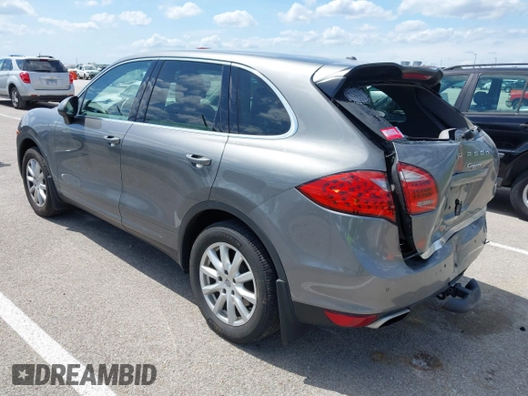 2014 Porsche Cayenne z VIN WP1AA2A2XELA91523, wystawiony jako IAAI lot #42538298 z przebiegiem 67 001 mil mil oraz . Historia ofert i sprzedaży dostępna na DreamBid. Obrazek 3.