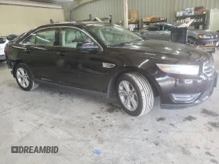 2014 Ford Taurus SEL z VIN 1FAHP2E80EG128686, wystawiony jako Copart lot #57158255 z przebiegiem 69 529 mil mil oraz Szkoda całkowita • Salvage title. Historia ofert i sprzedaży dostępna na DreamBid. Obrazek 4.