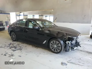 2018 BMW 5 Series 540i xDrive with VIN WBAJE7C56JWC57314, listed as a Copart auction lot 60610715 with 73,015 mi miles and Salvage title. Bid and sale history available at DreamBid. Image 4.