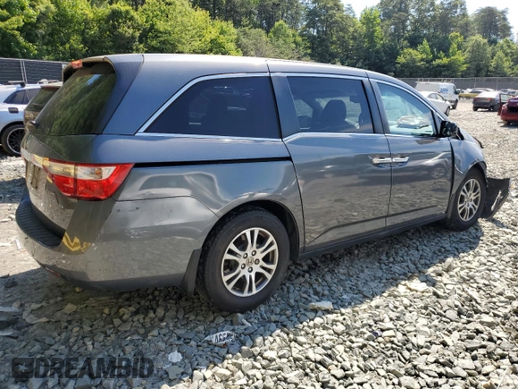 2012 Honda Odyssey EX-L with VIN 5FNRL5H69CB019771, listed as a Copart auction lot 59333624 with 197,203 mi miles and Salvage Title. Bid and sale history available at carsss.com. Image 3.
