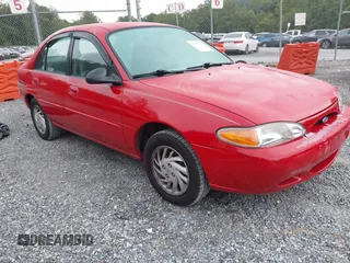 1997 Ford Escort LX z VIN 1FALP13P6VW375778, wystawiony jako IAAI lot #42787699 z przebiegiem 86 715 mil mil oraz . Historia ofert i sprzedaży dostępna na DreamBid. Obrazek 1.
