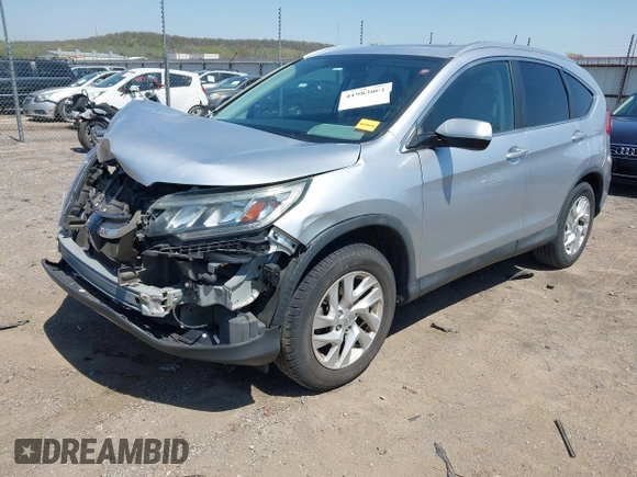 2015 Honda CR-V EX-L with VIN 2HKRM3H70FH552818, listed as a IAAI auction lot 41983061 with 202,898 mi miles and . Bid and sale history available at carsss.com. Image 2.