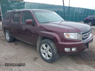 2011 Honda Ridgeline RTL with VIN 5FPYK1F51BB007959, listed as a IAAI auction lot 41894350 with 186,926 mi miles. Bid and sale history available at carsss.com. Image 1.