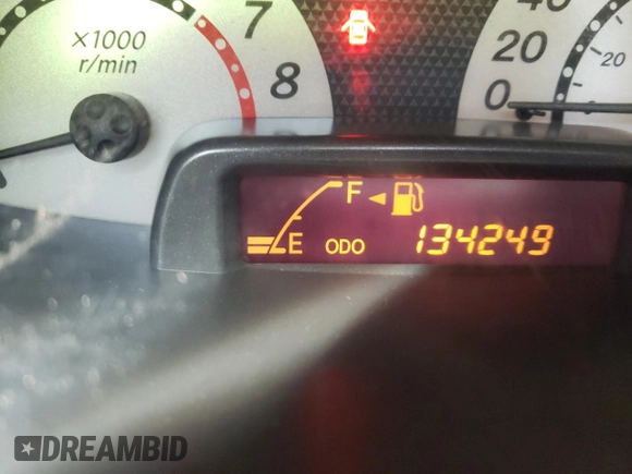 2005 Toyota ECHO z VIN JTDJT123X50066099, wystawiony jako Copart lot #74203284 z przebiegiem 134 249 mil mil oraz Szkoda całkowita • Salvage title. Historia ofert i sprzedaży dostępna na DreamBid. Obrazek 9.