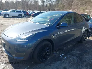2023 Tesla Model Y Long Range with VIN 7SAYGAEE9PF905943, listed as a IAAI auction lot 41444255 with 11,179 mi miles and . Bid and sale history available at DreamBid. Image 16.