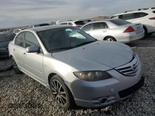2006 Mazda 3 s with VIN JM1BK324261542255, listed as a Copart auction lot 84252034 with 196,030 mi miles and Salvage Title. Bid and sale history available at DreamBid. Image 4.