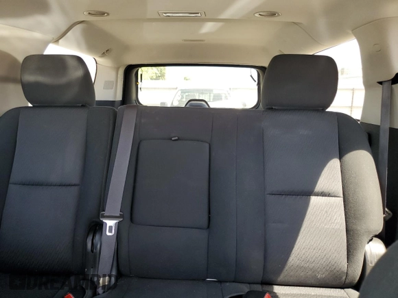 2014 Chevrolet Suburban LS with VIN 1GNSCHE03ER132039, listed as a Copart auction lot 68390234 with 129,744 mi miles and Salvage Title. Bid and sale history available at carsss.com. Image 10.