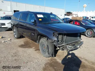 2015 Chevrolet Suburban LTZ with VIN 1GNSCKKC8FR641914, listed as a IAAI auction lot 41602673 with 128,388 mi miles. Bid and sale history available at carsss.com. Image 1.