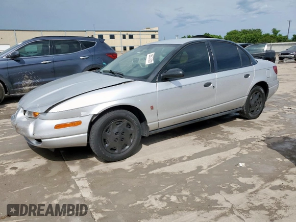 2002 Saturn SL с VIN 1G8ZH52892Z242469, выставлен на аукционе Copart как лот 59973755 с пробегом Не указан миль и Списание • Salvage title. История ставок и продаж доступна на DreamBid. Изображение 1.