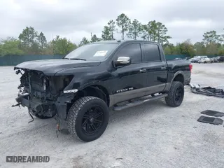 2019 Nissan Titan SV with VIN 1N6AA1E56KN507810, listed as a IAAI auction lot 41947972 with 54,059 mi miles. Bid and sale history available at carsss.com. Image 2.